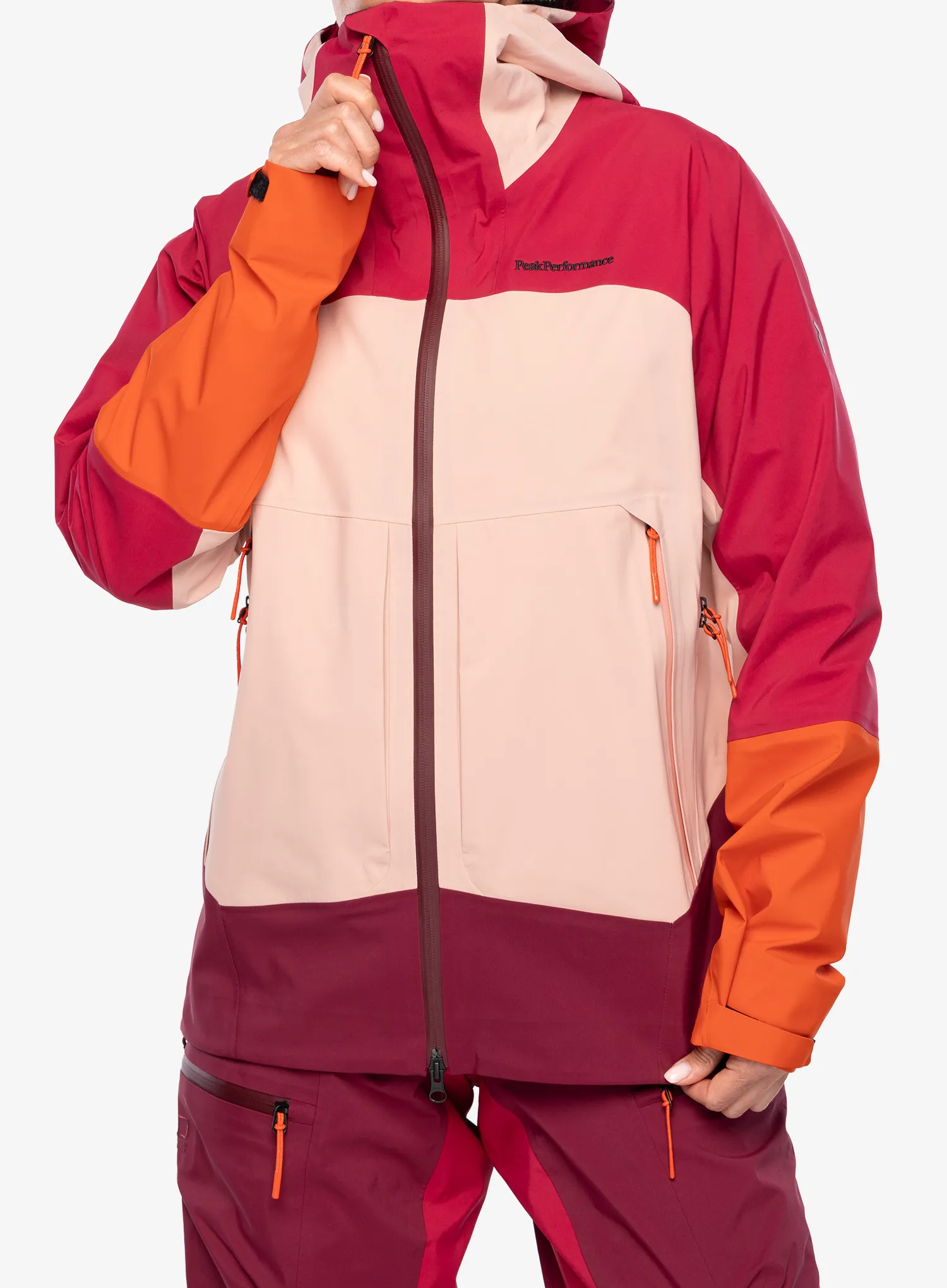 PeakPerformanceVislightGore_TexC_KnitJacket_techburgundy_peachfuzz7333269908798a.webp